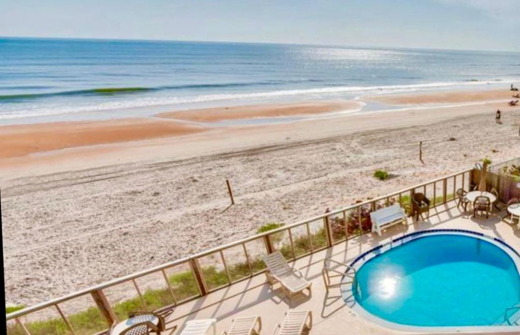 Beachfront Bliss - At Symphony Club Holiday home *